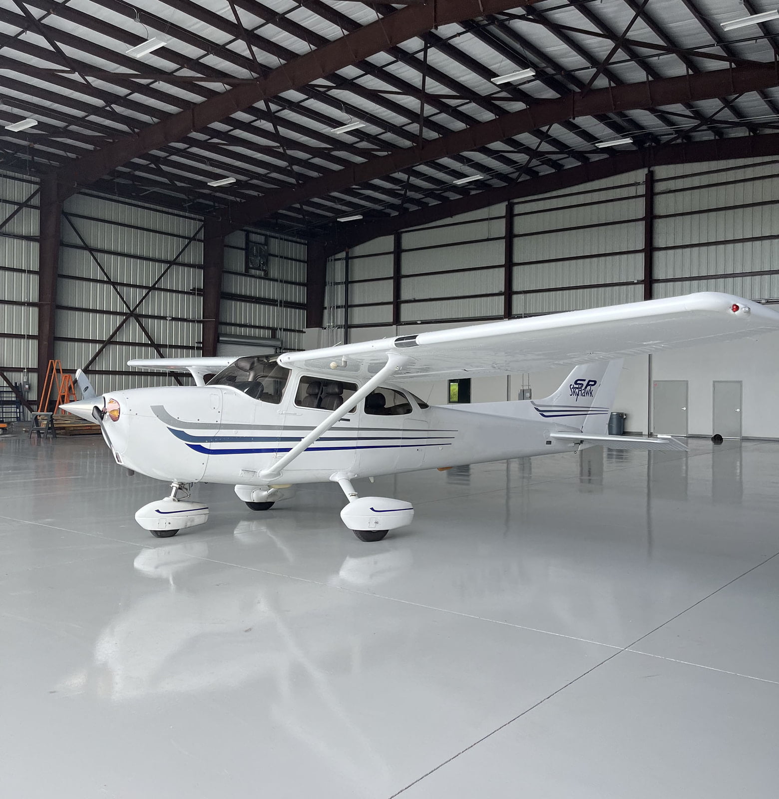 red iron steel aircraft hangar